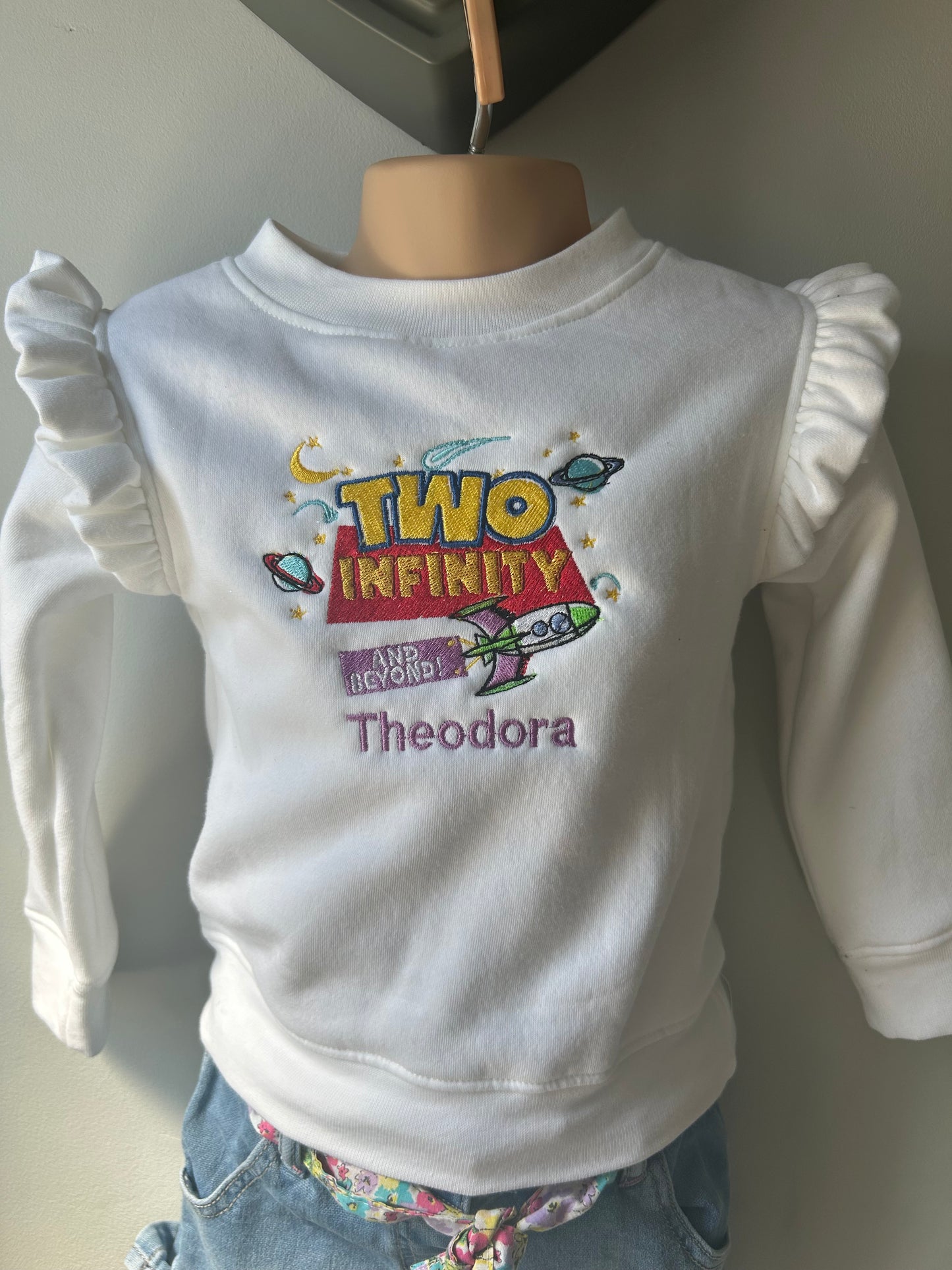 Two infinity birthday frill jumper